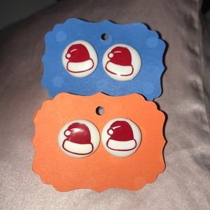 2 Matching Santa hat button earring pairs.